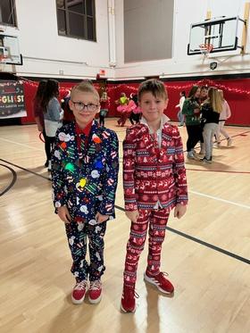 Students wear Christmas suits to the dance